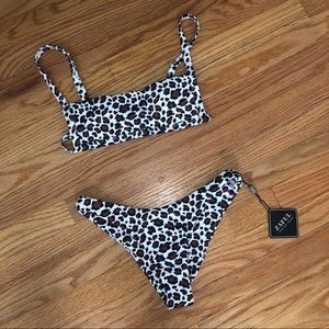 Small animal print bathing suit, with tags on!